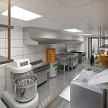 Restaurant Commercial Kitchen Featuring Stainless Steel Worktables Mixer Bamboo Steamers Range Hood And Tile Walls