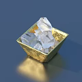 Golden Bowl Filled With Transparent Shiny Ice Cubes On Blue Surface
