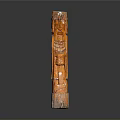 Natural Landscape With Orange Wooden Totem Pole Carved Faces And Patterns