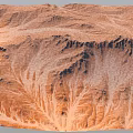 Detailed Natural Mountain Landscape With Rolling Hills And Sandy Brown Terrain