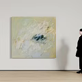 Abstract Oil Painting With Soft Beige White And Dark Brush Strokes Hanging On White Wall