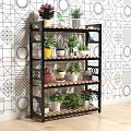 Garden Decorative Multi Tiered Shelf Holding Various Potted Plants With Colorful Pots And Geometric Wall