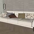 Modern Cream Colored Three Seater Sofa With Decorative Pillows And Wooden Floor In Living Room