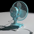 Blue Tabletop Electric Fan With White Blades Metal Grill Stable Base And Power Cord