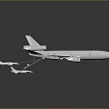 Large Tanker Aircraft Refueling Two Small Fighter Jets in Mid Air