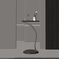 Modern Sleek Curved Metal Side Table With Black Tabletop For Stylish Home Living Space Decoration