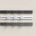 Three Strip Kitchen Appliances With Control Knobs In Black And White