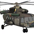 Military Camouflage Helicopter Flying Over Wooded Area With Extended Landing Gear