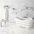 White Bathtub With Faucet In Modern Bathroom With Marble Floor Shelves Towels Plant And Mirror
