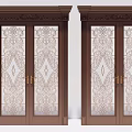 Elegant Wooden Double Doors With Intricate Patterned Glass And Golden Handles