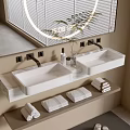Modern Bathroom Vanity With Round Mirror Double Sinks Towels And Toiletries