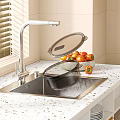 Modern Kitchen Countertop with Sink Faucet Covered Pot and Fruit Bowl