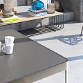 Modern Dining Table Set With Orange And Beige Chairs Concrete Wall And Shelves