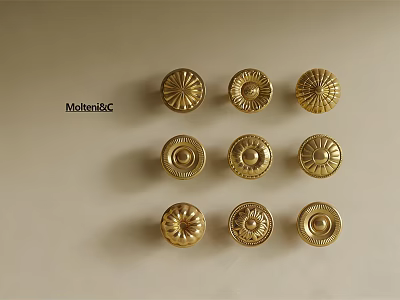 Collection Of Golden Decorative Cabinet Knobs With Various Intricate Patterns For Home Furniture 3d model