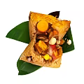 Traditional Chinese Zongzi Stuffed With Glutinous Rice Chestnuts And Salted Egg Yolk On Green Leaves