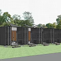 Black Container Homestay Building With Glass Doors On Green Lawn Among Trees