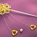 Luxurious Gold Flower Hairpin With Silver Chains Gold Heart Decorations And Pearl On Purple Background