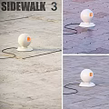 White Spherical Device With Orange Circular Light On Stone Floor And Black Cable