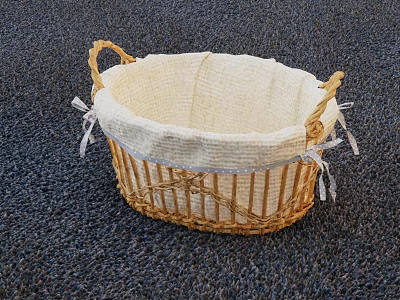 Wicker Storage Basket With Light Fabric Lining And White Lace Trim On Dark Carpet 3d model