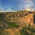 Natural Garden Landscape With Rolling Hills And Lush Green Vegetation