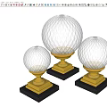 Three Transparent Spherical Trophies With Golden Base And Black Pedestal