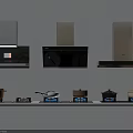 Modern Kitchen Appliances Three Range Hoods Wall Mounted And Five Stoves On Shelf
