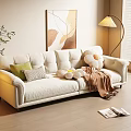 Beige Three Seater Sofa with Green Pillows Stuffed Bear and Blanket in Living Room with Floor Lamp