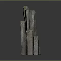 Stone And Wood Stacked Decorative Sculpture With Various Heights And Textured Surfaces