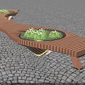 Curved Wooden Outdoor Bench With Planter Green Plants White Flowers Cobblestone Ground Illuminated Base