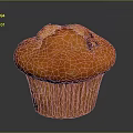 Golden Fluffy Muffin With Chocolate Chips In Paper Liner On Dark Background