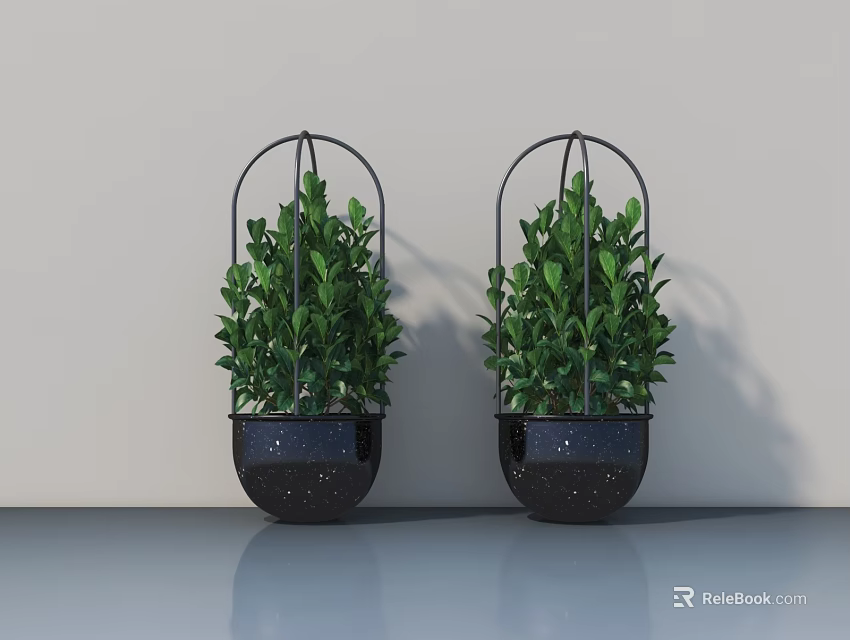 Two Green Potted Plants in Black Spotted Pots With Metal Frames Against Light Gray Wall 3d model 