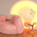 Pink Fluffy Single Sofa With Gold Side Table Dried Flowers And Warm Yellow Light Projection On Wooden Floor