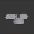 Leica Digital Camera With Silver Body Gray Accents And Classic Lens Design