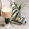 Decorative Ornament Set With Woven Shade Lamp Green Plant And Glass Vase On Books