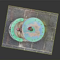 Architectural Model Featuring Green Curved Roof Red Pillars Wheels At Base And Stone Slab