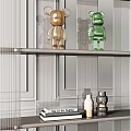 Modern Transparent Glass Bookcase With Decorative Figurines Books And Small Decor Items