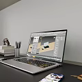 Laptop On Modern Workspace With Design Software Display Mobile Phone Stationery And Books