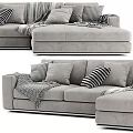 Modern Light Gray Sectional Sofa With Multiple Pillows And Cozy Blankets 3d model