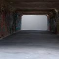 Long Urban Tunnel With Graffiti Covered Walls And Concrete Floor