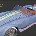 Blue Vintage Convertible Sports Car With White Stripes Red Rims And Chrome Exhaust Pipes