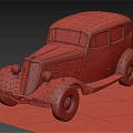 Vintage Black Car with Retro Grille Headlights and Old Tires on Gravel Ground