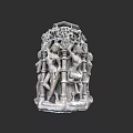 Intricately Carved Stone Pillar With Human Figures And Vine Decorations