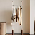 Freestanding Clothing Rack With Clothes And Bag In Minimalist Living Room