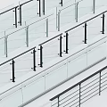 Glass Fence with Black Metal Posts and Modern Railing Design
