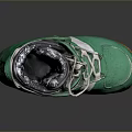 Green Snowboard Boots With White Laces Orange Sole And Soft Inner Lining Design