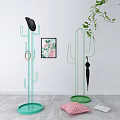 Green Cactus Shaped Coat Racks With Black Hat Umbrella On White Wall Gray Floor