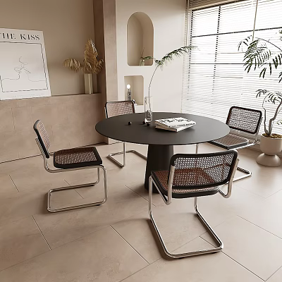 Modern Round Black Dining Table With Wicker Chairs Metal Frame And Plants 3d model