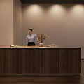 Spacious Two Story Exhibition Hall With Modern Display Tables And Wall Artworks