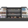 Retail Display Case With Assorted Desserts Bottled Drinks And Canned Goods In Confectionery Shop