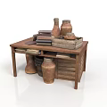 Artisanal Carved Clay Sculptures Displayed On Wooden Table With Books And Vessels